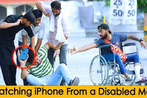 SNATCHING IPHONE 13 PRO MAX FROM A DISABLED MAN @Crazy Prank TV